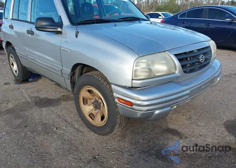 2003 Suzuki Vitara from USA, damaged, VIN 2S3TD52V636101810